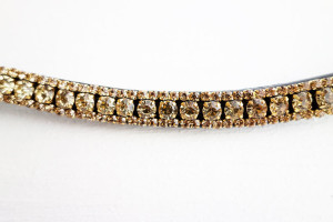 Smalt pannband i guld